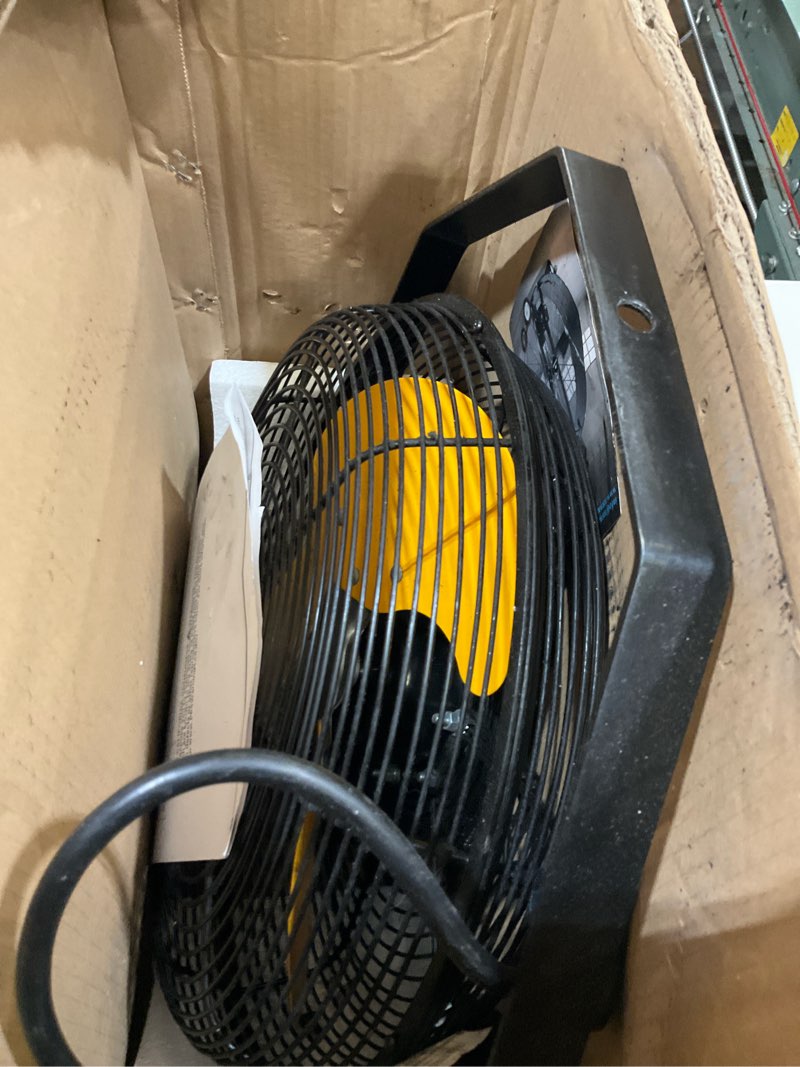 Condition photo showing As Is for wall fan 12”