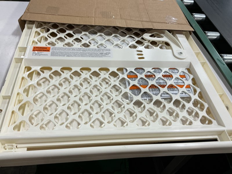 Condition photo showing New/Like New for toddleroo by north states 42” wide supergate ergo baby gate, made in usa: for doorways or stairways. includes wall cups. pressure or hardware mount. 26” - 42” wide (26" tall, ivory) (b0065adp4c)