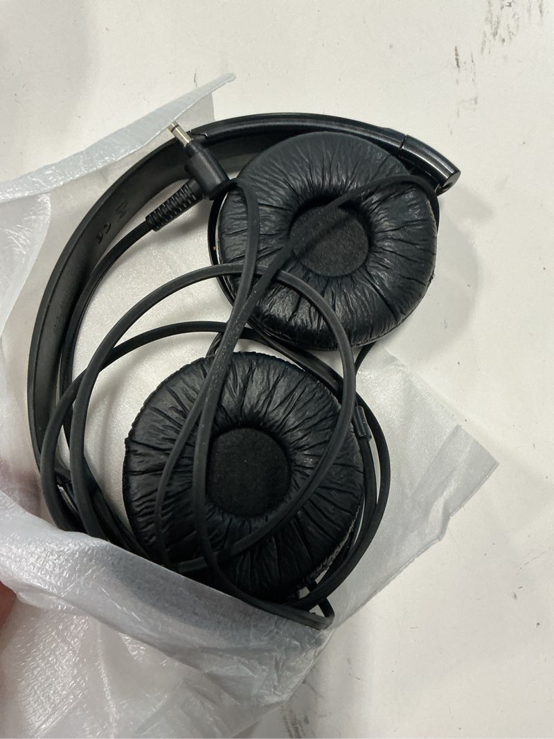 Condition photo showing As Is for zx series stereo headphones in black