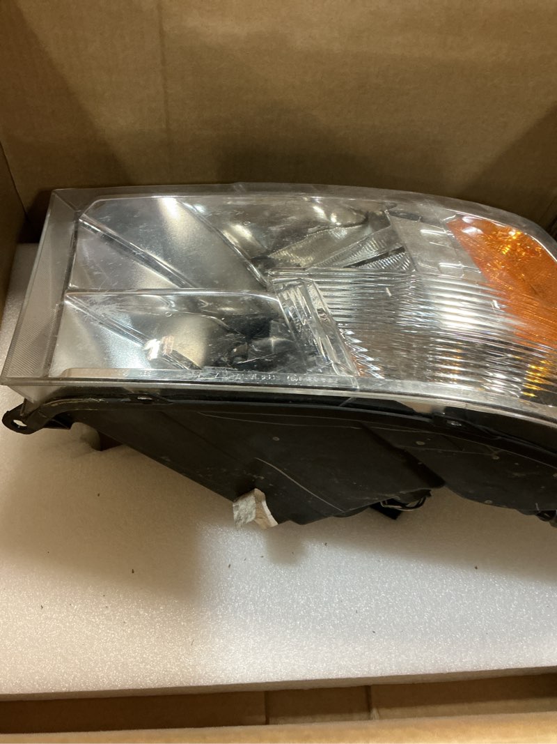 Condition photo showing As Is for replacement repd100123q headlight compatible with 2011-2012 ram 1500 2010 dodge 2500v driver side