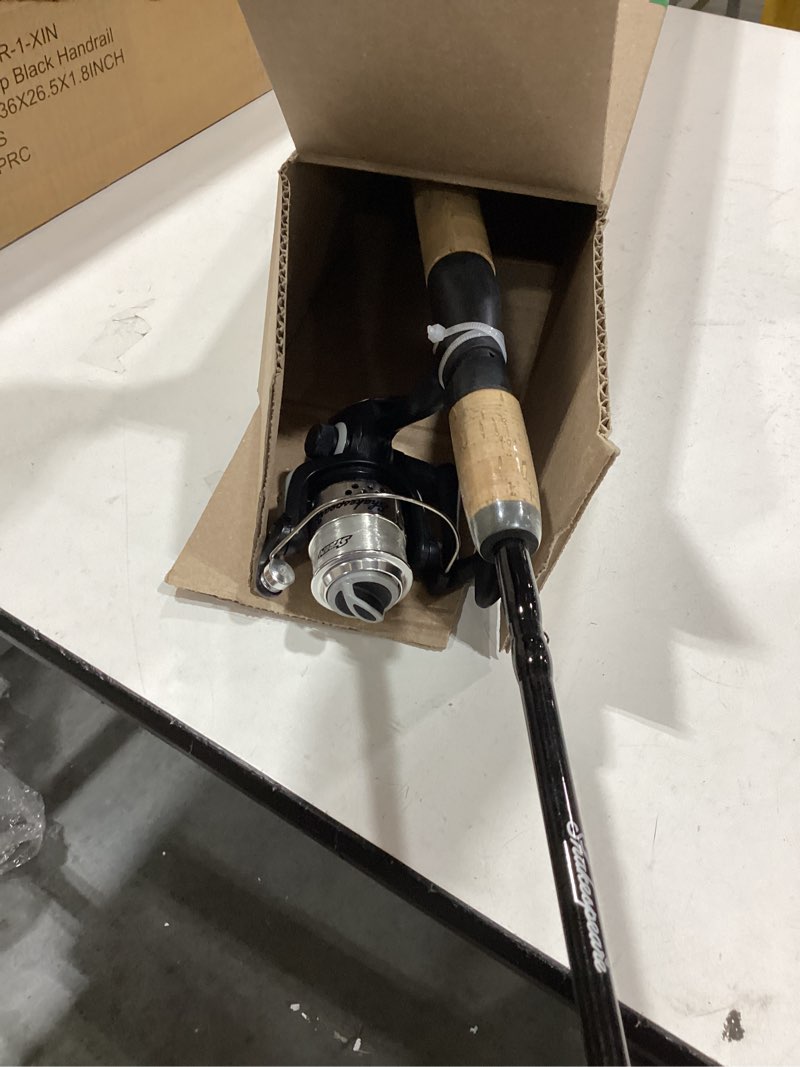 Condition photo showing Good Condition for shakespeare cirrus 6'6" spinning fishing rod and reel combo, 2-piece graphite rod blank, size 30 spinning reel, pre-spooled with monofilament fishing line