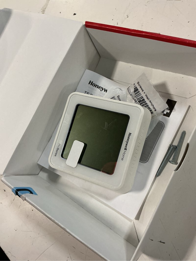 Condition photo showing As Is for honeywell home t5 smart with white bezel thermostat: 1-year warranty, plastic, 4.06" height, no battery required
