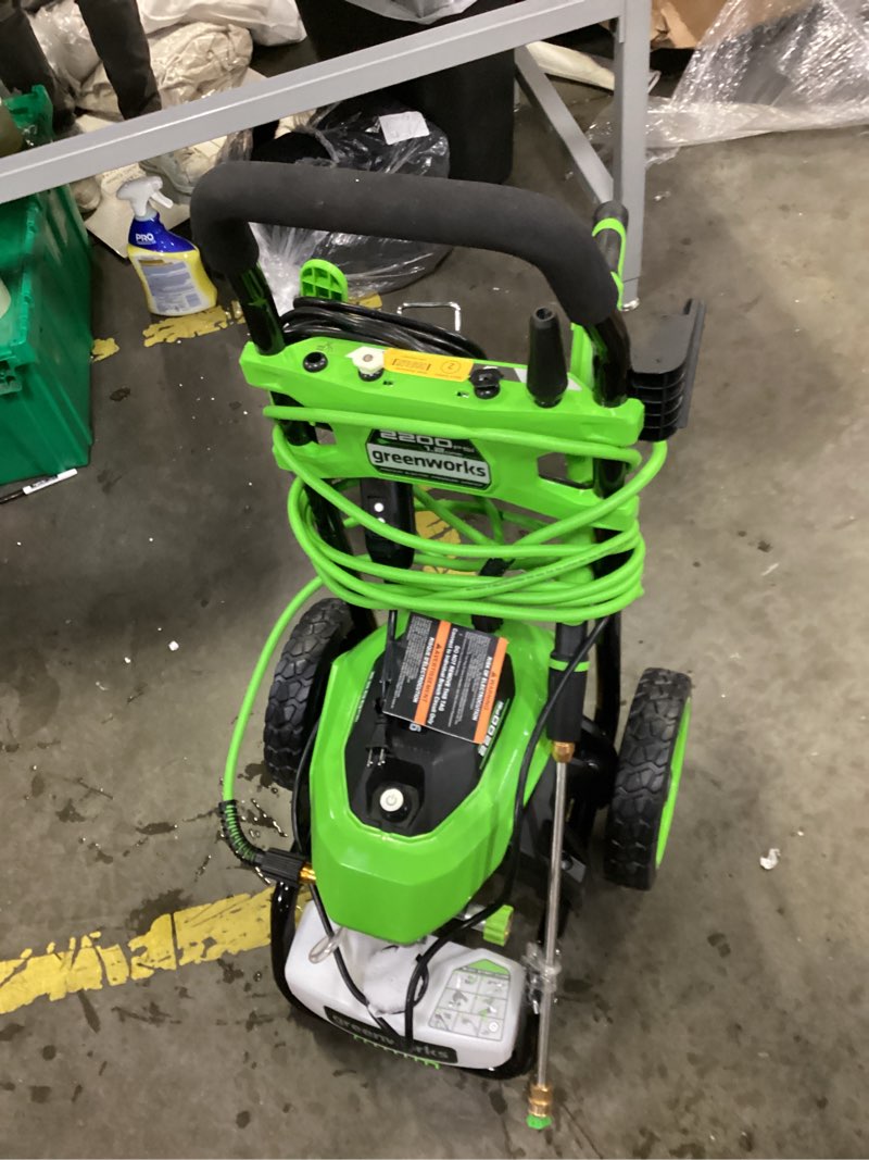 Condition photo showing As Is for greenworks 2200-psi 1.2-gpm cold water electric pressure washer with 4 spray tips