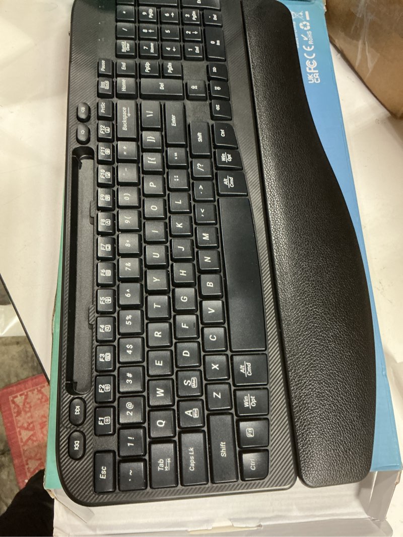 Condition photo showing Good Condition for Ergonomic Wireless Keyboard with Cushioned Wrist Rest, Wave Keys, Phone Holder, Comfortable Natural Typing, 2.4GHz Full Size Cordless USB Computer Keyboard for Windows, Mac OS, Laptop, PC (Black)
