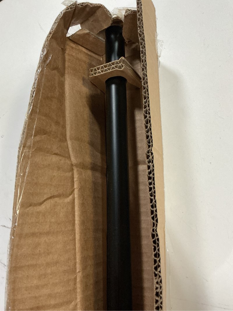 Condition photo showing Good Condition for amazon basics adjustable sturdy spring tension curtain rod, no drilling/no holes, 54-90", black, classic finial black 54-90" indoor