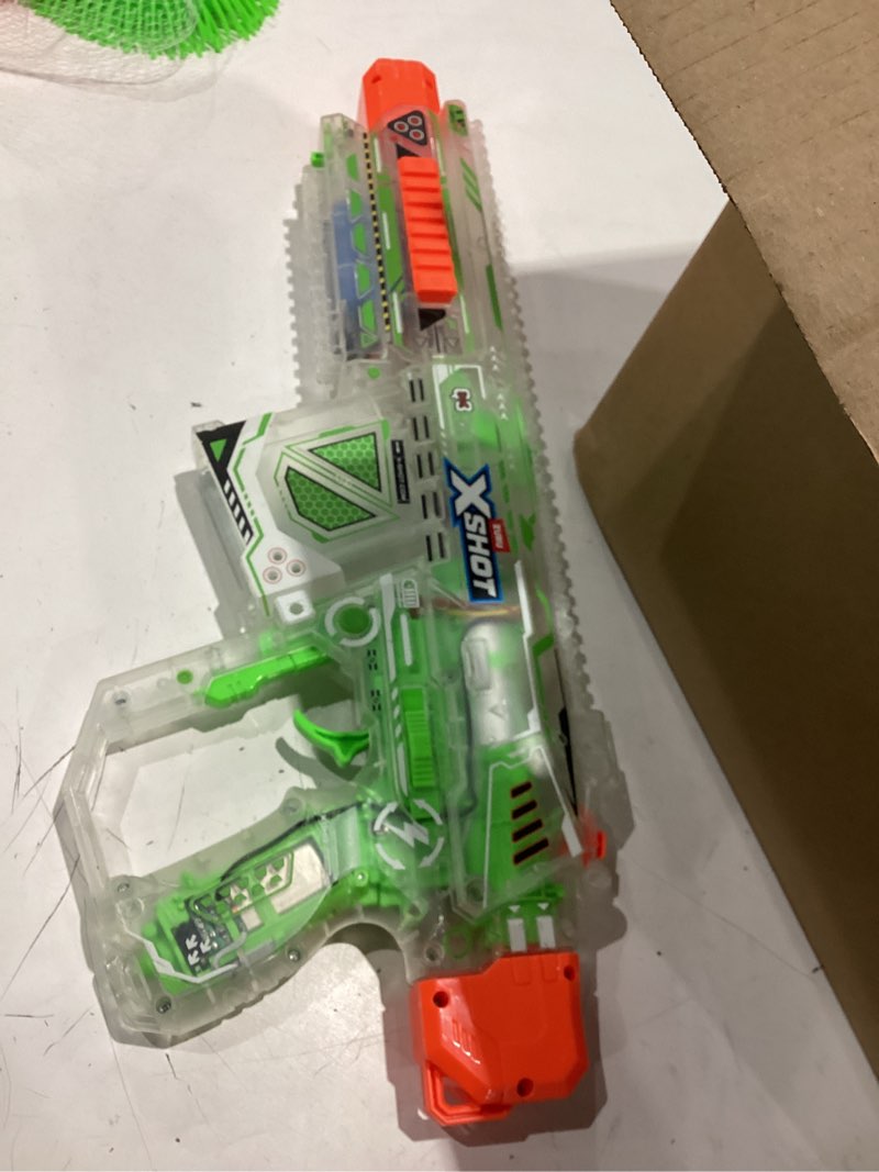 Condition photo showing As Is for hyper glow in the dark nightmare blaster, semi and fully automatic blaster & 10,000 glow in the dark hyper pellets, 700 capacity mag, eyewear, ages 14 & up by zuru