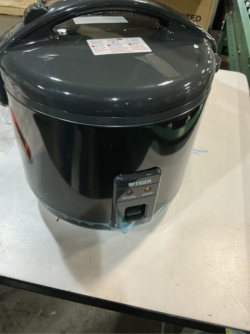 Condition photo showing New/Like New for Tiger JNP-S18U-KY 10 Cup Capacity White Rice Cooker with Non-Stick Inner Pot, Retractable Power Cord, and Keep Warm up to 12 hours (Obsidian Black)