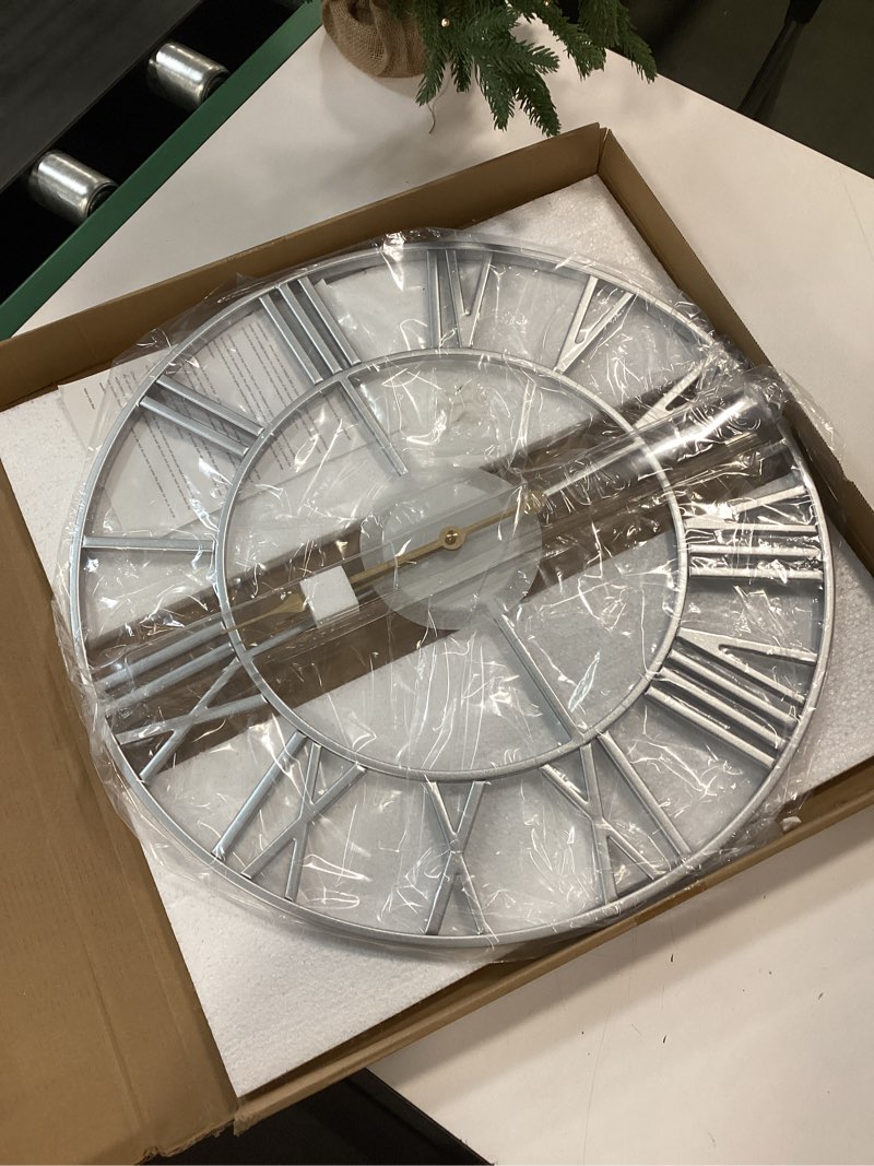 Condition photo showing New/Like New for Large Wall Clock 20 Inch Silver Decorative Clock, Modern Metal Round Wall Clock Roman Numerals Battery-Operated Wall Clocks for Living Room Bedroom, Kitchen, Office Silver Roman Number 20 Inch