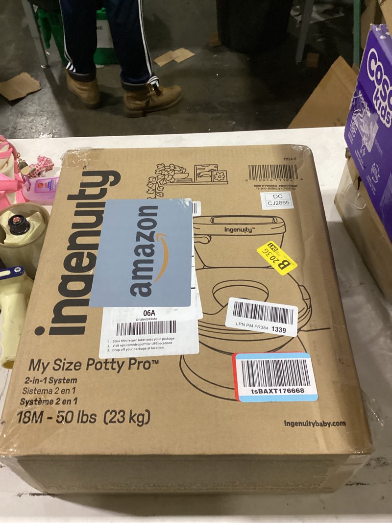 Condition photo showing New/Like New for ingenuity my size potty pro 2-in-1 potty training toilet, floor potty with removable potty seat for standard toilets, realistic flushing sound, for toddlers ages 18+ months, up to 50 lb white