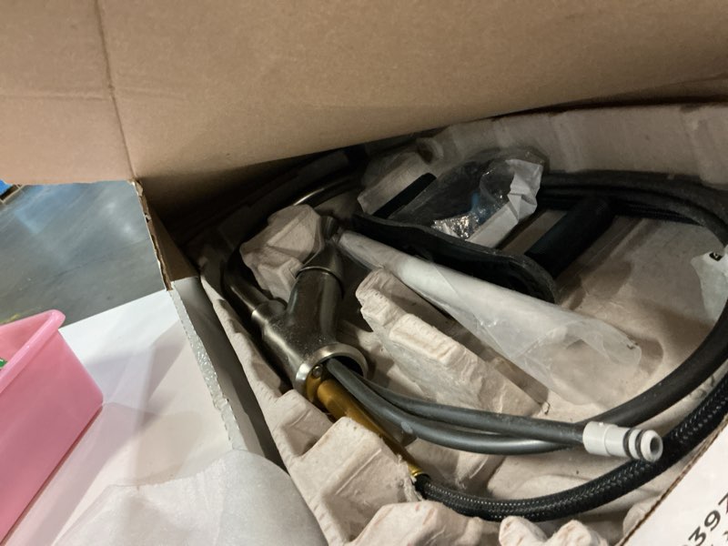 Condition photo showing As Is for delta ophelia brushed nickel kitchen faucet with pull down sprayer, modern single hole kitchen sink faucet, single handle, spotshield stainless 19888z-sp-dst