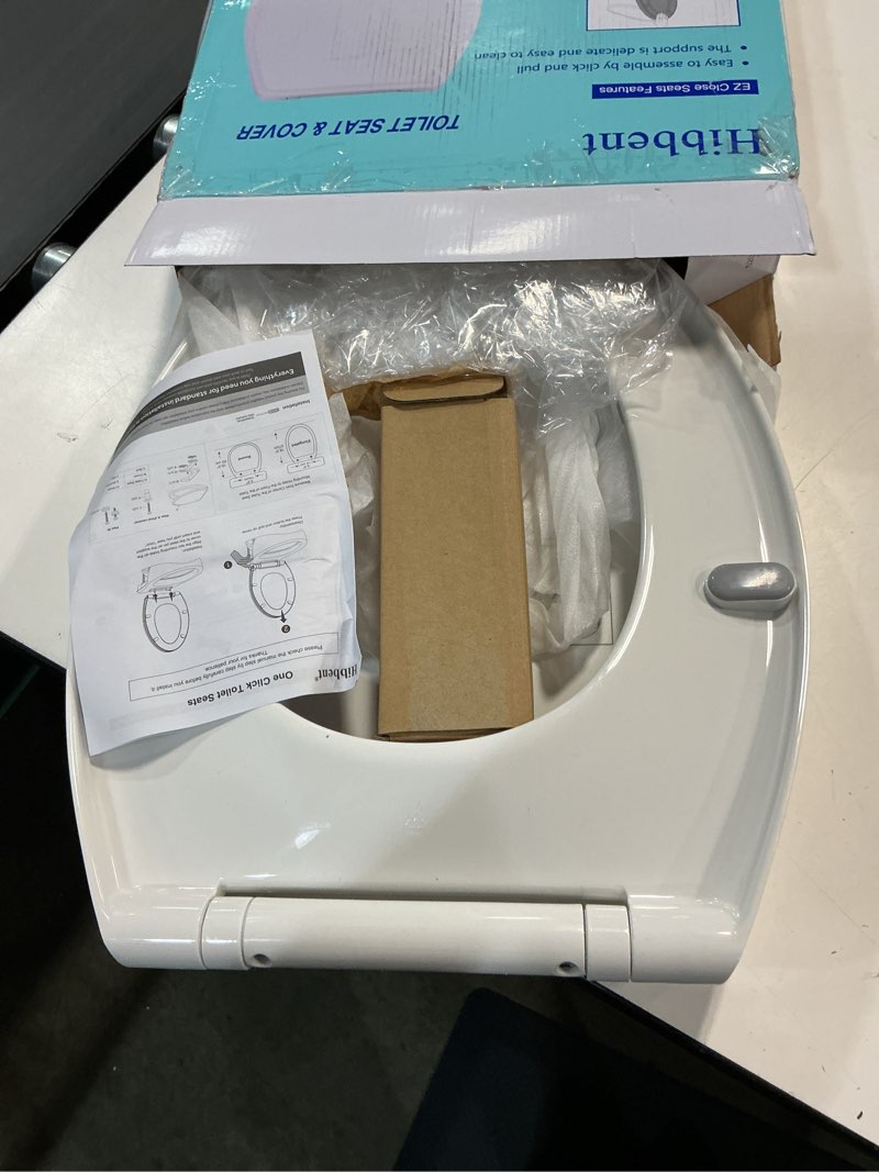 Condition photo showing Good Condition for Hibbent Premium Elongated Toilet Seat with Cover Quiet Close, One-Click to Quick Release, Easy Installation Non-Slip Seat Bumpers, Slow Close Toilet Seat and Cover, Easy Cleaning-White Color One-click Elongated 18.5" White