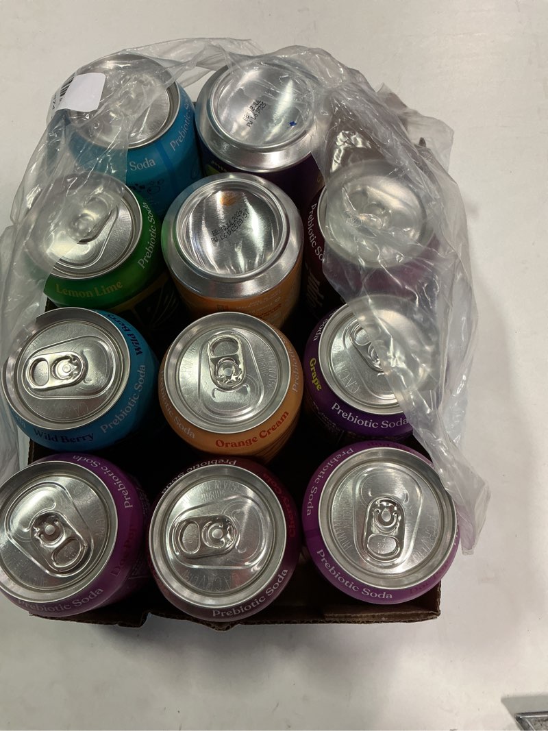 Condition photo showing Good Condition for (Best by 10-jul-2026)Poppi Sparkling Prebiotic Soda Beverage with Apple Cider Vinegar, Seltzer Water and Fruit Juice, Crowd Pleasers Variety Pack, 12 Fl Oz, Pack of 12, Packaging May Vary (Variety) Crowd Pleasers 12 Fl Oz (Pack of 12)