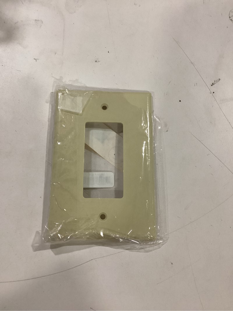 Condition photo showing As Is for  Eaton 1 -Gang Jumbo Size Ivory Thermoplastic Indoor Decorator Wall Plate