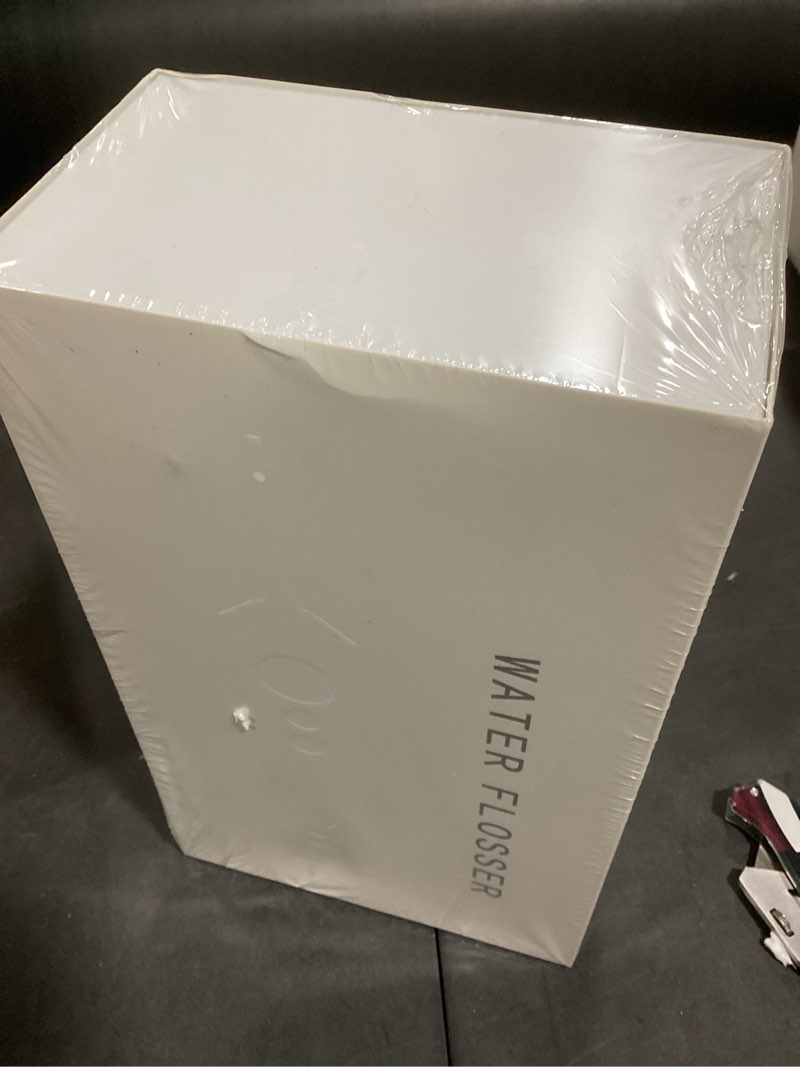 Condition photo showing New/Like New for Water Dental Flosser for Teeth, Portable Cordless Water Flosser with 300ML Rechargeable with Type-C, IPX7 Waterproof Water Flossers for Adults with 3 Intensity Modes and 3 Flossing Tips Bordeaux