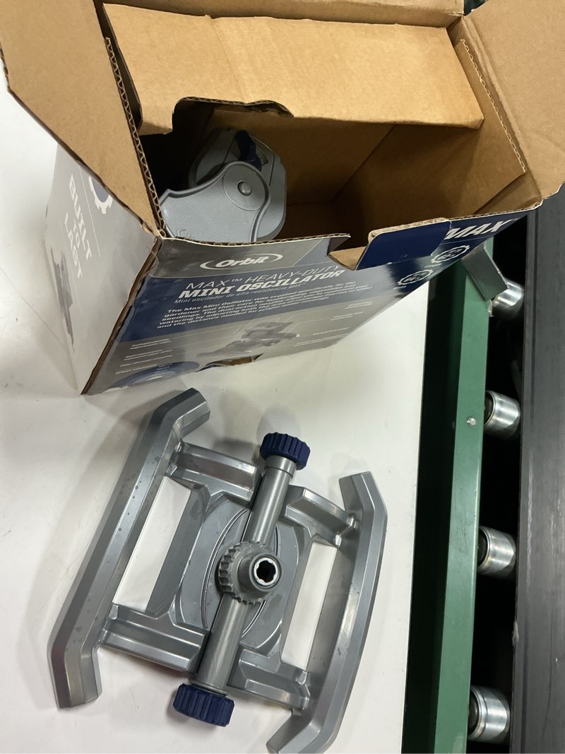 Condition photo showing As Is for orbit max 3900-sq ft oscillating sled lawn sprinkler