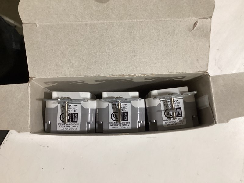Condition photo showing item condition for Eaton 15 -Amp 125-volt GFCI Residential Decorator Outlet Receptacles , White 3 -Pack