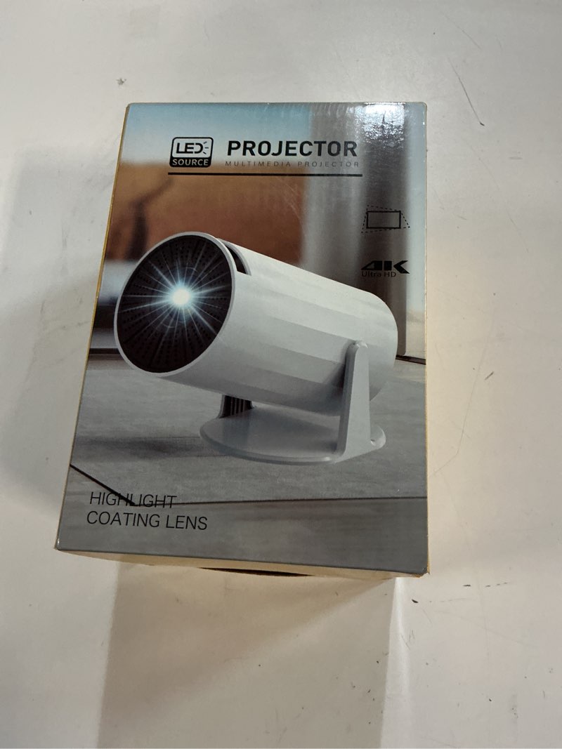 Condition photo showing New/Like New for portable projector, built-in speakers, screen mirroring, dual-band wifi,premium surround sound, android/ios/windows compatible, hdmi/usb/audio 3.5 support