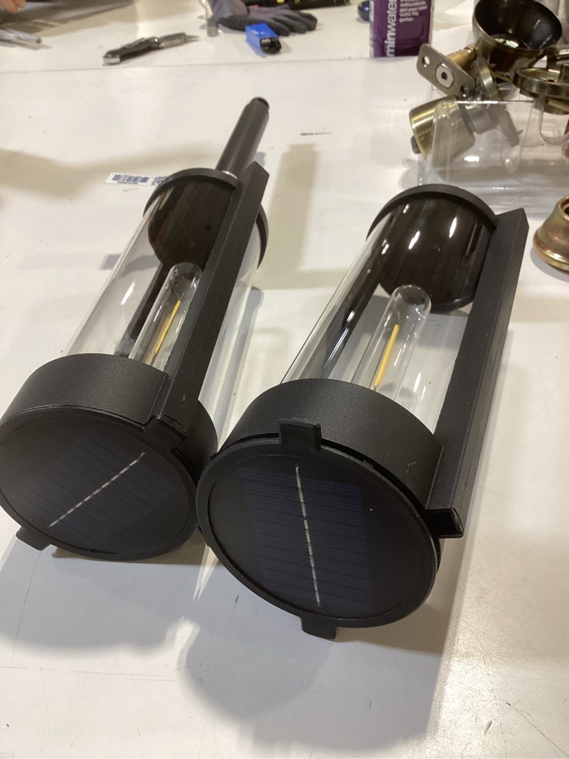 Condition photo showing As Is for 2 harbor breeze 15 -lumens matte black solar led outdoor path light ( 3000-k )