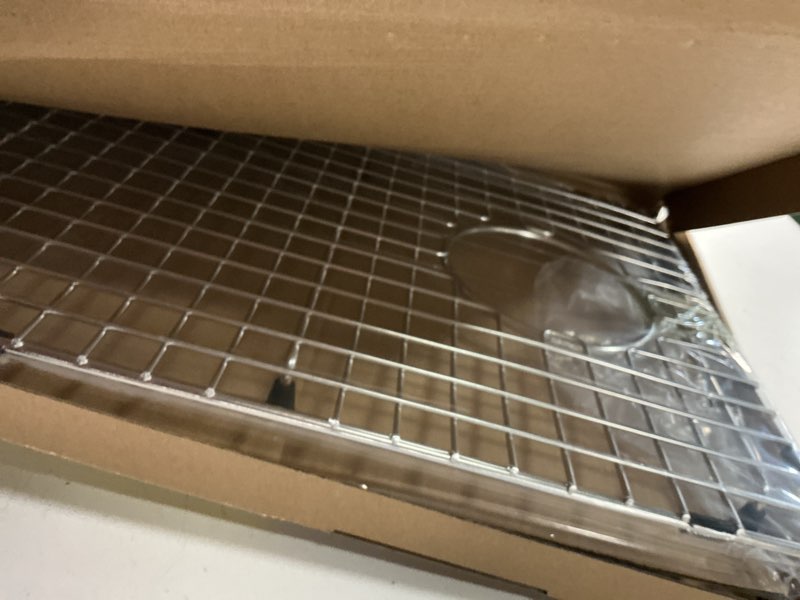 Condition photo showing New/Like New for serene valley sink bottom grid 26-15/16" x 14-1/16", side drain with corner radius 3/8",ndg2714s