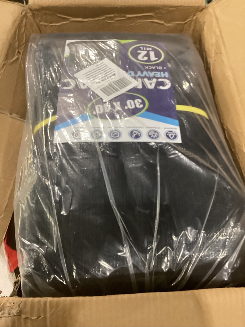 Condition photo showing New/Like New for black tarps heavy duty waterproof 30x40, 12 mil thick, high durability, rip and tear resistant with metal grommets every 20 inches black 30 ft x 40 ft