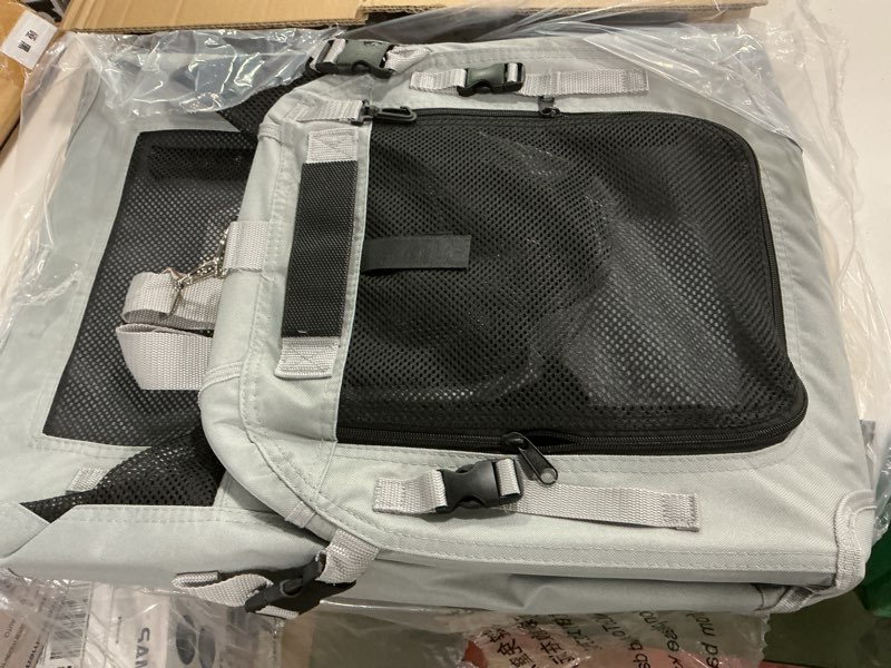 Condition photo showing As Is for Lesure Collapsible Dog Crate - Portable Travel Kennel for Large Dog, 4-Door Pet Crate with Durable Mesh Windows, Indoor & Outdoor, Light Gray 36.0\"L x 25.0\"W x 25.0\"H Light Grey Similar to the photo