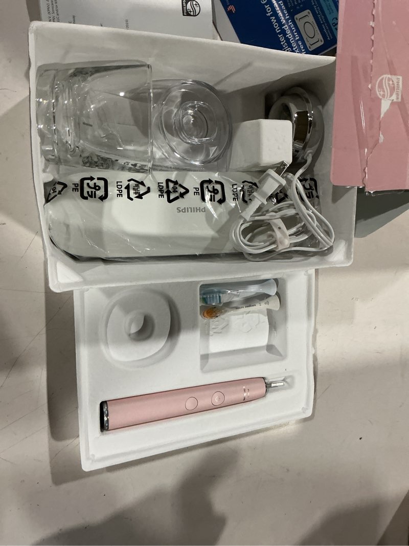 Condition photo showing As Is for philips sonicare diamondclean smart 9300 electric toothbrush, sonic toothbrush with app, pressure sensor, brush head detection, 4 brushing modes and 3 intensity levels, pink, model hx9903/25 1 count (pack of 1) new pink