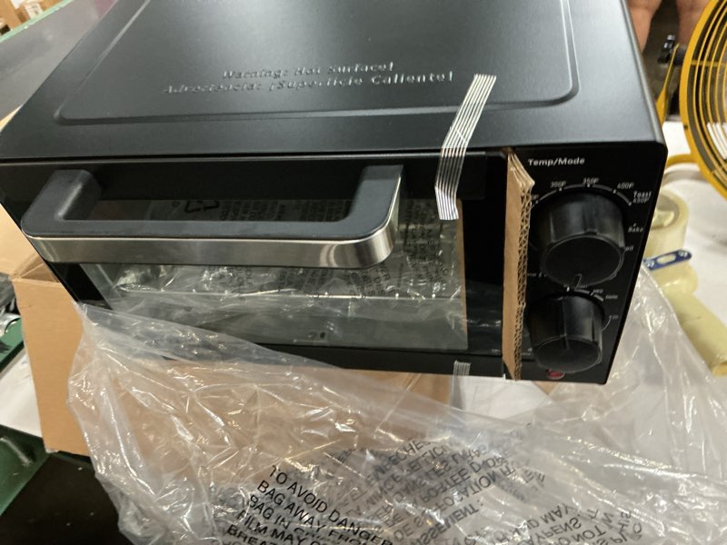 Condition photo showing New/Like New for mainstays 4 slice countertop toaster oven with 3 settings, includes baking rack and pan, black, new