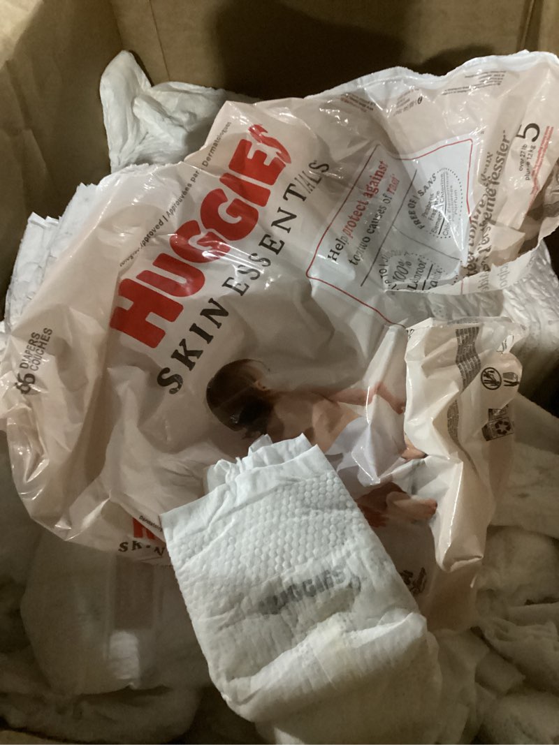 Condition photo showing As Is for huggies size 5 diapers, skin essentials baby diapers, size 5 (27+ lbs), 17 count, packaging may vary size 5 17