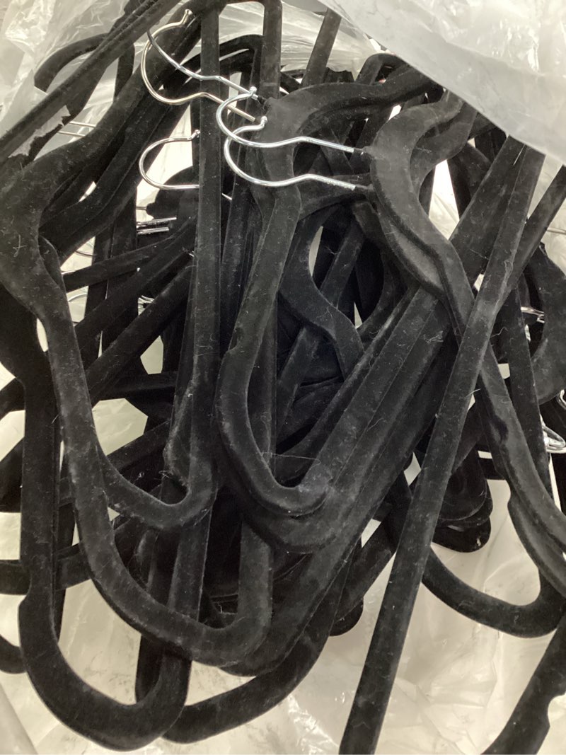 Condition photo showing As Is for HOUSE DAY Premium Velvet Hangers 50 Pack Black, Non-Slip Flocked Felt Hangers, Sturdy Clothes Hangers with 360° Rotatable Hook, Heavy Duty Coat Hanger, Durable Slim Hanger for Closet Space Saving 50 Pack Black/ Silver