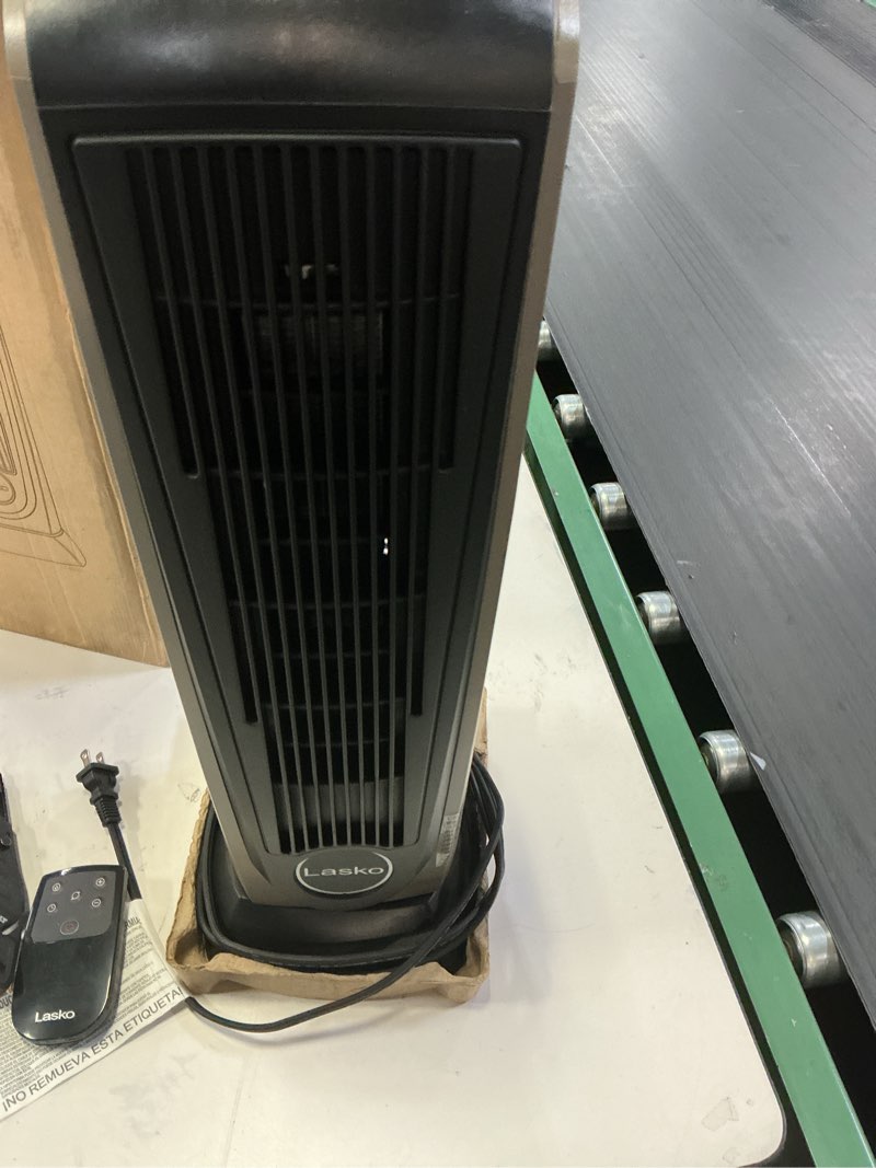 Condition photo showing As Is for Lasko 1500W Ceramic Tower Space Heater with Remote, Thermostat, Timer & Widespread Oscillation, Portable Electric Heater for Indoor Use, Bedroom & Living Room, 751320