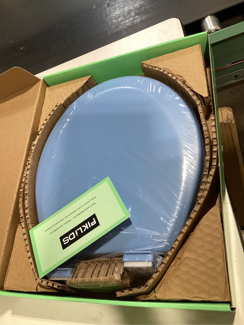 Condition photo showing New/Like New for toilet seat, slow close, soft touch, ultra-smooth matte finish (no orange-peel texture), premium moulded wood, quick release, piklids (royal blue, round) royal blue round