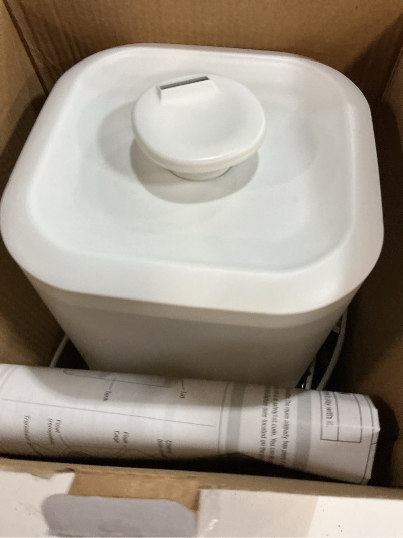 Condition photo showing As Is for safety 1st easy-fill cool mist humidifier, white