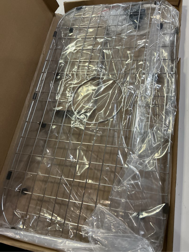 Condition photo showing Good Condition for Serene Valley Sink Protector Grid 26-1/16" x 14-1/16", Centered Drain with Corner Radius 3-1/2", 304 Stainless Steel Material NLW2614C
