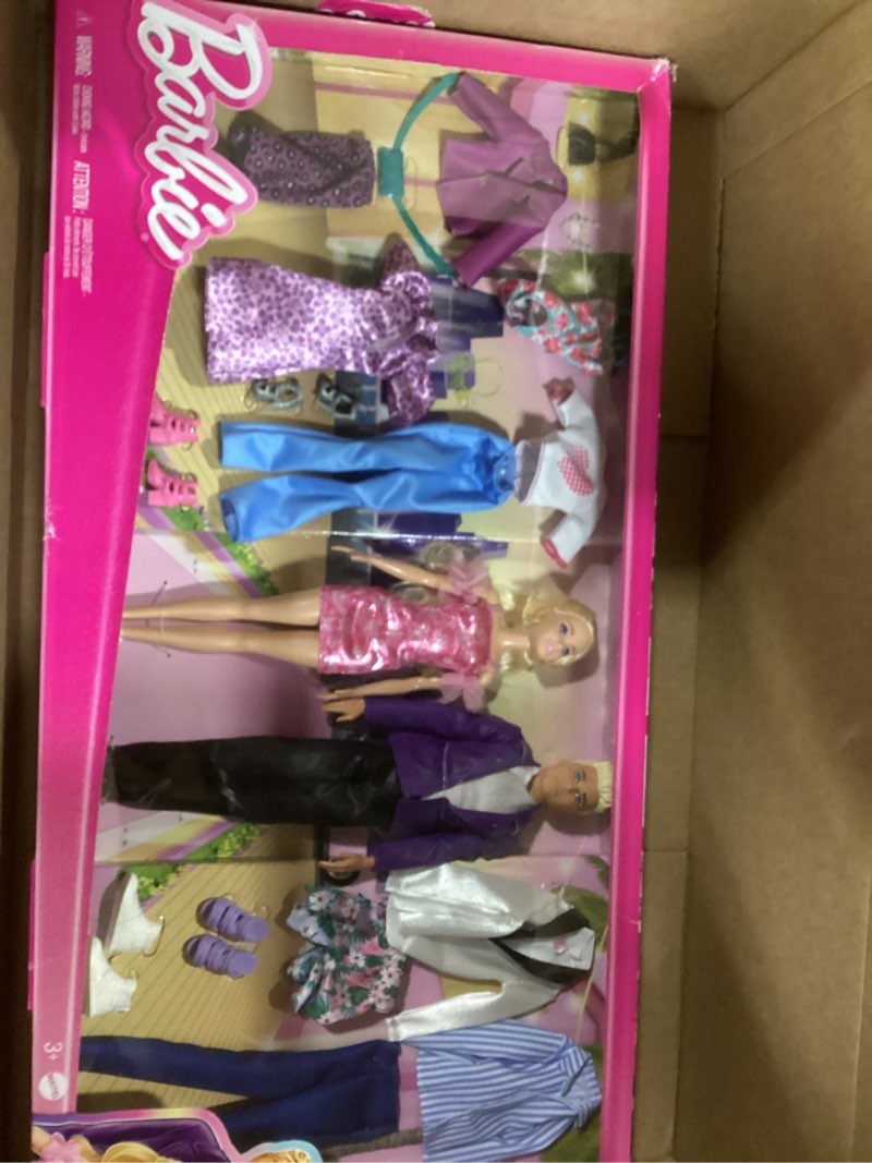 Condition photo showing New/Like New for Barbie & Ken Doll Set with 2 Fashion Dolls, Clothes & Accessories, Includes Dresses, Tees, Pants, Swimsuits & More