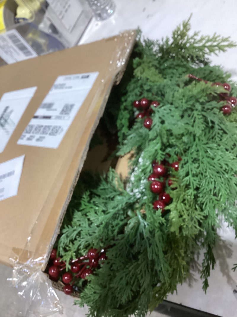 Condition photo showing Good Condition for Glitzhome 24" D Christmas Wreath for Front Door, Real Touch Green Artificial Cedar Wreath with Red Berries for Porch, Window, Wall Indoor and Outdoor Home Decor