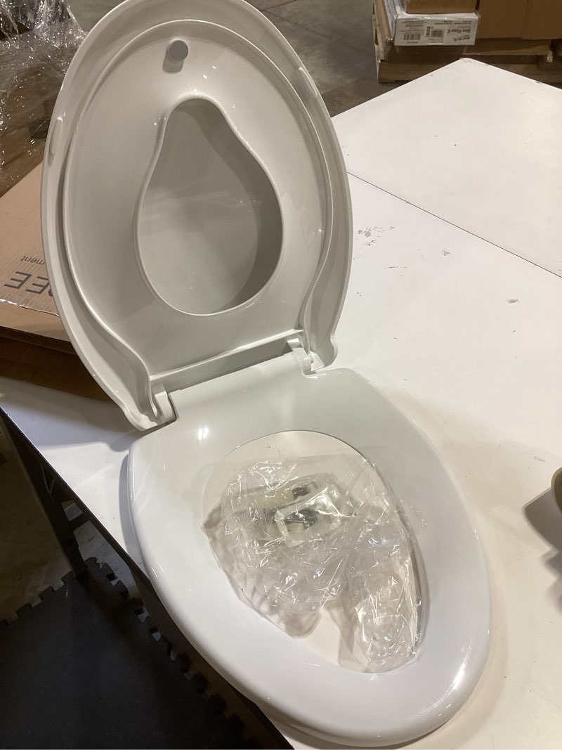 Condition photo showing Good Condition for elongated toilet seat with toddler seat built in soft close, slow close family toilet seat with potty training seat white