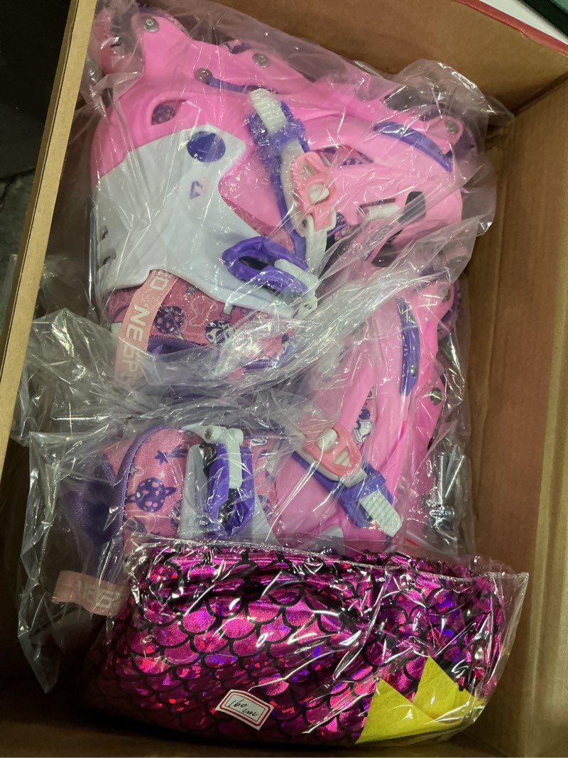 Condition photo showing New/Like New for inline skates, adjustable childrens inline skates with light up wheels for girls, boys, teens, beginner | with protective gears and carry bag pink - with dinosaur cloak large - youth (4-7 us)