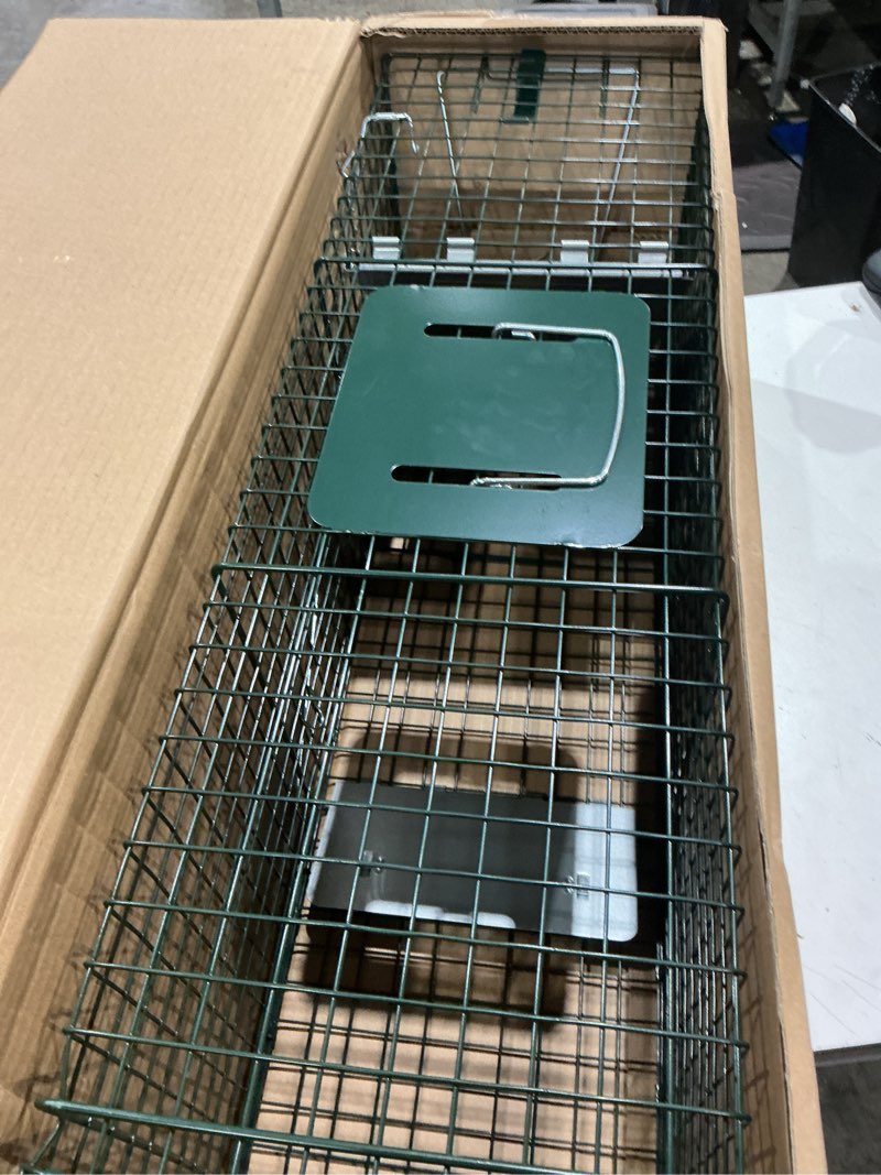 Condition photo showing As Is for humane way sentinel 32 inch live animal trap - no assembly required - safe medium traps for all animals - raccoons, cats, groundhogs, opossums - 32" l x 10.5" w x 12.5" h