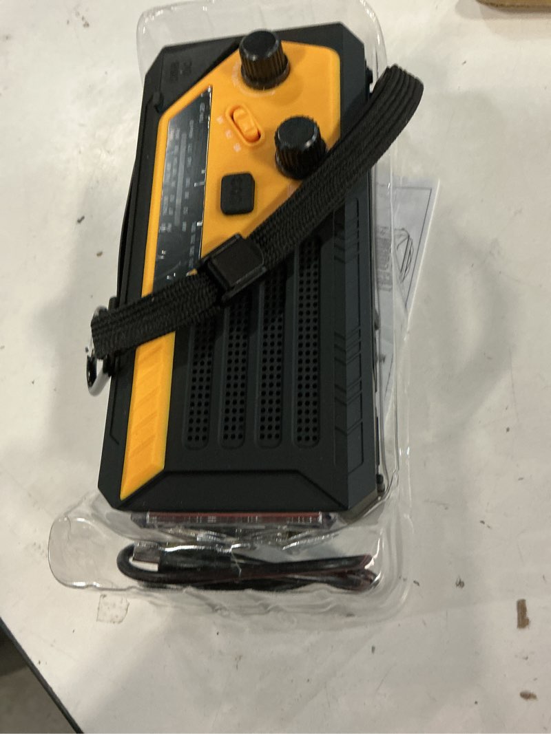 Condition photo showing Good Condition for Emergency Radio with 4 Charging Cables, 22000mWh AM FM NOAA Weather Radio, Flashlight, Reading Lamp, SOS Alarm, Phone Charging Hand Crank Radio for Home Outdoor Emergencies. Yellow