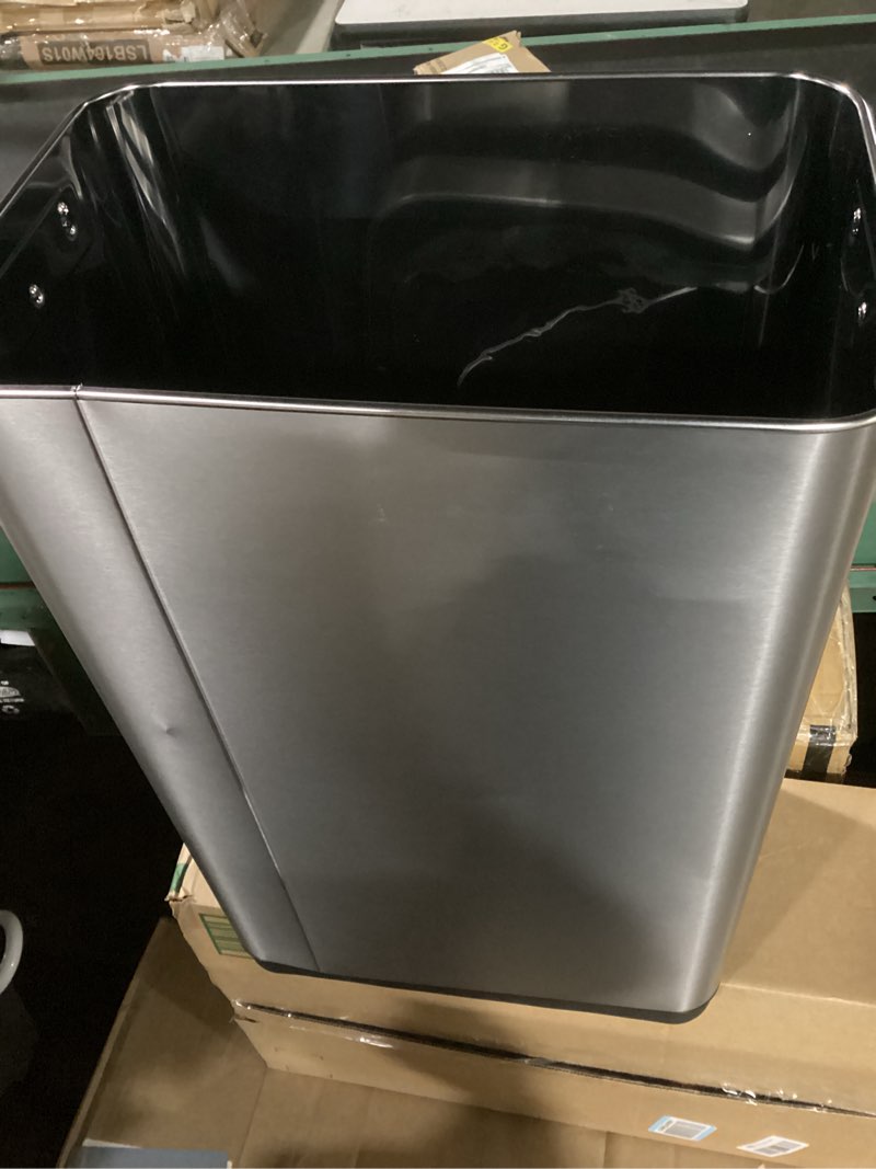 Condition photo showing As Is for songmics motion sensor trash can, 13-gallon (50 l) automatic garbage can with soft close lid, stainless steel, wave or touch to open, includes 15 bags, metallic silver and ink black ultb640e01 motion sensor trash can metallic silver + ink black