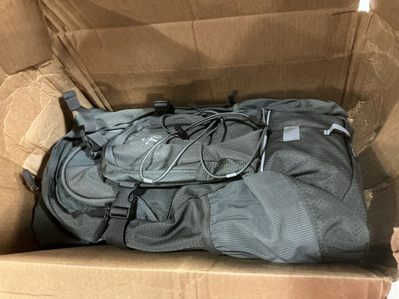 Condition photo showing As Is for teton oasis/trailrunner hydration backpack – lightweight water pack with 2l/3l bladder for hiking, running, cycling, biking 18l/22l sizes – sewn-in rain cover – fits men and women 22 liters gunmetal