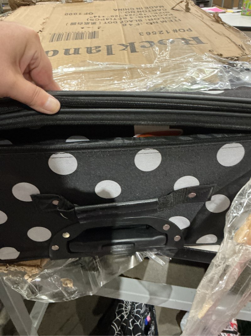 Condition photo showing Good Condition for rockland polka softside upright luggage set, expandable, lightweight, black dot, 4-piece (14/19/24/28)