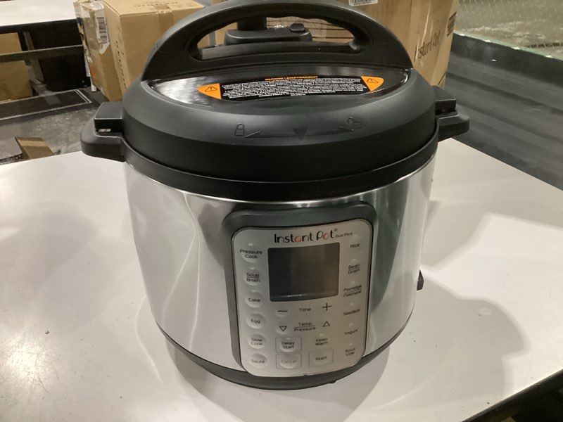 Condition photo showing As Is for instant pot duo plus 9-in-1 multicooker, pressure cooker, slow cook, rice maker, steamer, sauté, yogurt, warmer & sterilizer, includes app with over 800 recipes, stainless steel, 8 quarts