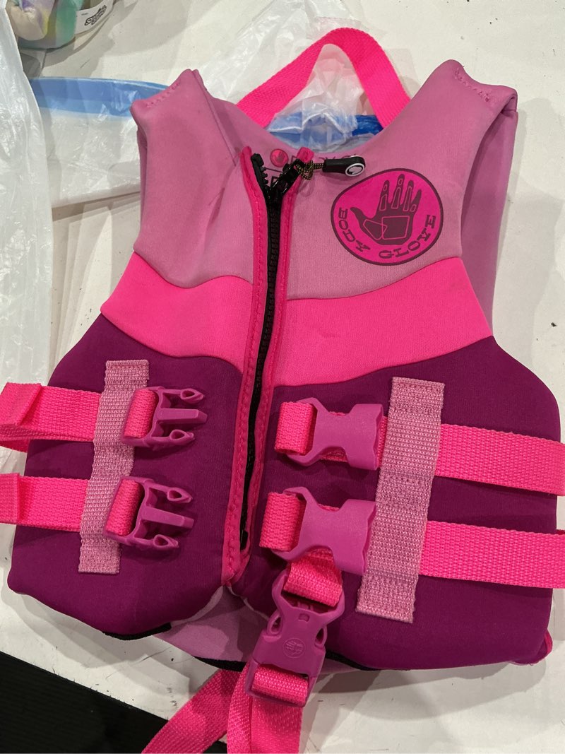 Condition photo showing As Is for body glove child's neoprene pfd life jacket and vest, girl, 33-55 lbs., pink