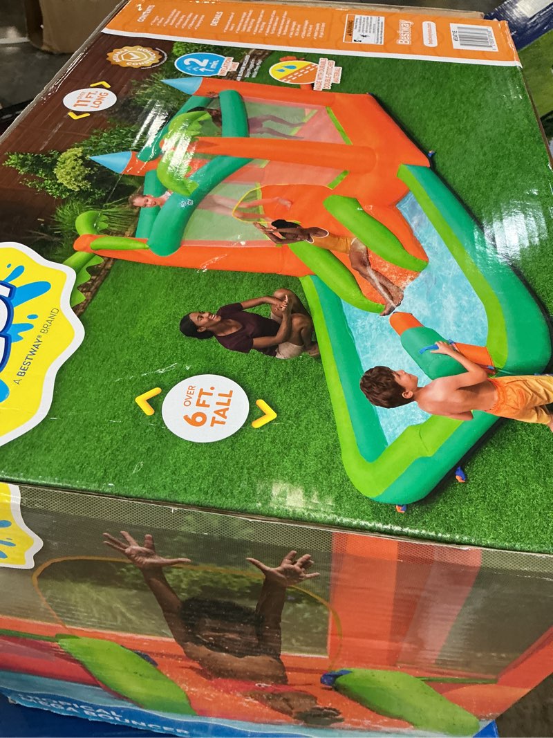 Condition photo showing As Is for h2ogo! kids tropical outdoor inflatable mega bouncer