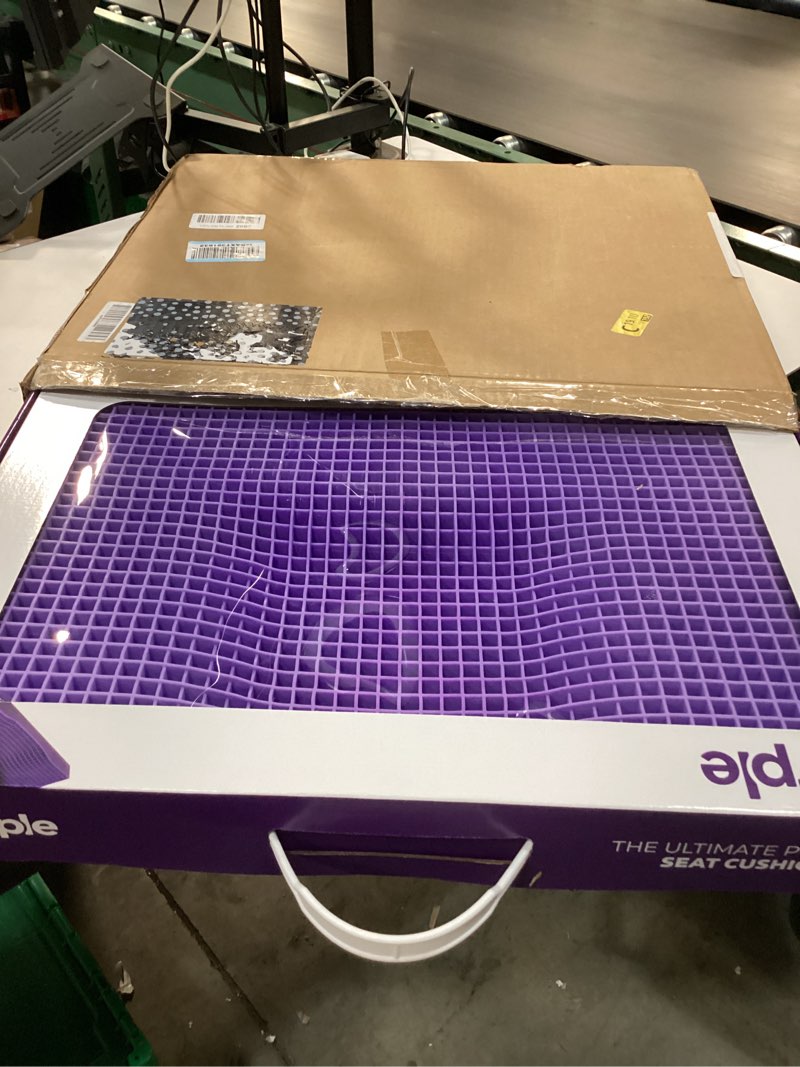 Condition photo showing New/Like New for purple ultimate seat cushion | pressure reducing grid designed for ultimate comfort | designed for gaming | made in the usa