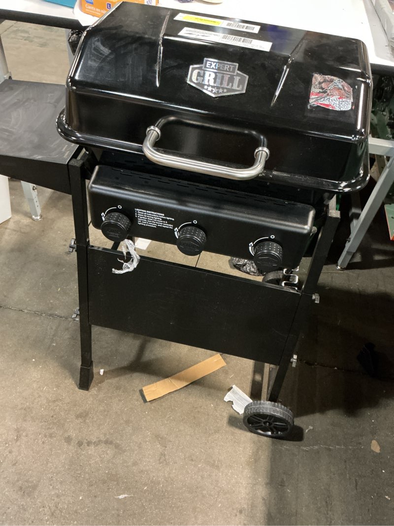 Condition photo showing As Is for expert grill 3-burner propane gas grill with wheels and side shelves, black