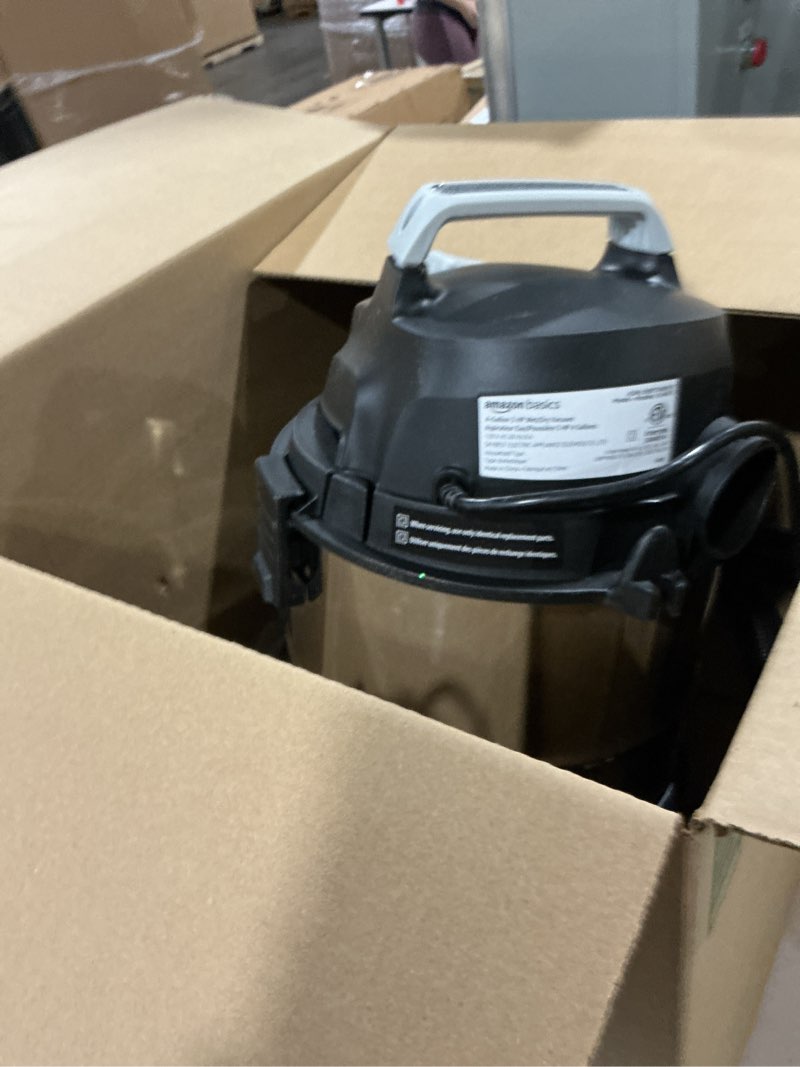 Condition photo showing As Is for Amazon Basics Wet Dry Vacuum Cleaner, 4 gallon Shop, 3 HP Stainless Steel, Grey/Black
