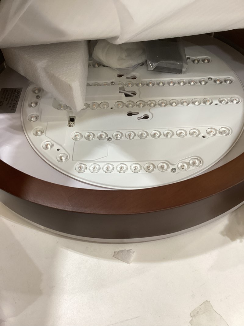 Condition photo showing Good Condition for 15IN 42W LED Flush Mount Ceiling Light Dimmable with Remote, 2700K-5000K Modern Farmhouse Oak Wood Grain Ceiling Light for Kitchen Bedroom Hallway Living Room Oak Wood 15 in