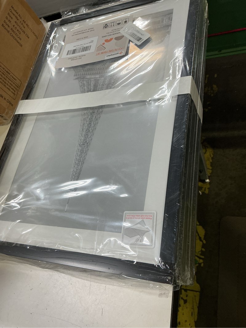 Condition photo showing Good Condition for upsimples 11x17 picture frame set of 5, display pictures 9x15 with mat or 11 x 17 without, wall gallery poster frames, black black 11x17